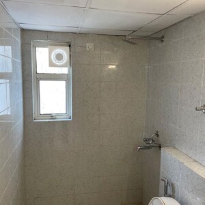 Bathroom in 2 BHK Apartment at Paras Tierea, Sector 137 – for Rent