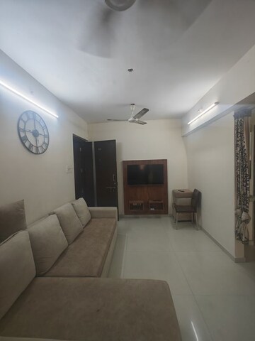 Living Room in 1 BHK Apartment at Om Prabhu Manohar CHS, Seawoods Sector 50 – for Rent