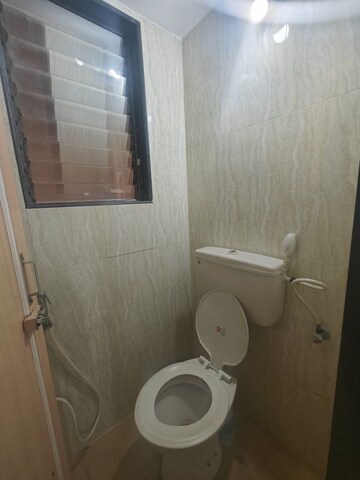 Bathroom in 1 BHK Apartment at Om Prabhu Manohar CHS, Seawoods Sector 50 – for Rent