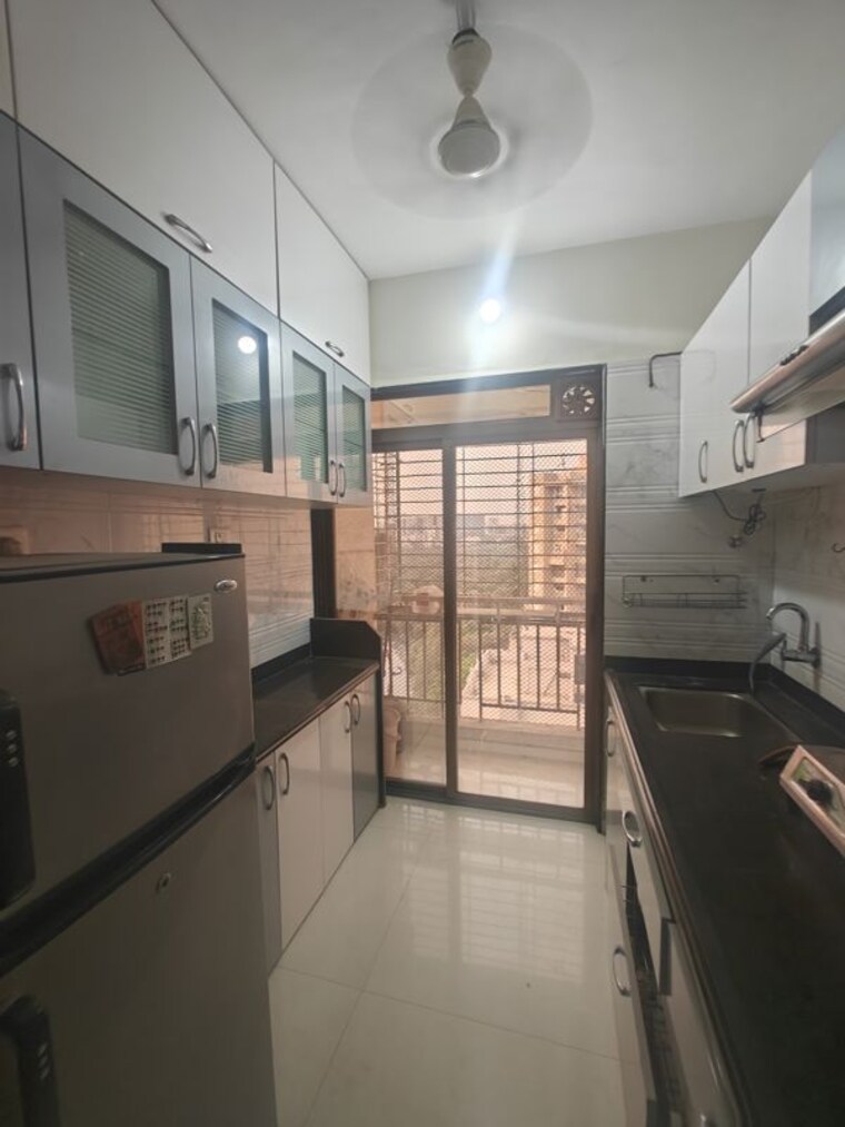 Kitchen, om-prabhu-manohar-chs 1 Bedroom 670 Sq.Ft. Apartment In Seawoods Sector 50 Navi Mumbai 9993814