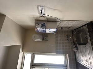 Kitchen in 2 BHK Apartment at Shree Vardhman Mantra, Sector 67 – for Rent