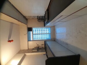 Kitchen in 3 BHK Apartment at Banjara Hills CHS	, Ulwe Sector 19b – for Rent