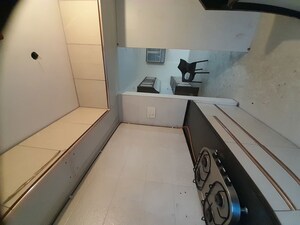 Kitchen in 3 BHK Apartment at Banjara Hills CHS	, Ulwe Sector 19b – for Rent