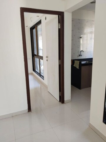 Building Lobby in 1 BHK Apartment at Chandak Next, Borivali East – for Rent