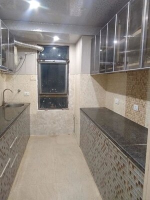 Kitchen in 2 BHK Apartment at Unitech Fresco, Sector 50 – for Rent