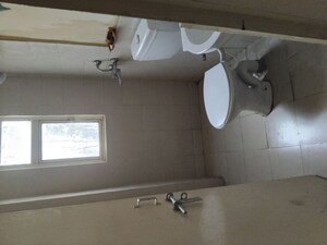 Bathroom in 3 BHK Apartment at Conscient Habitat Residences, Sector 78 – for Rent