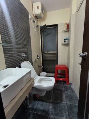 Bathroom in 2 BHK Apartment at Dosti Vihar, Samata Nagar – for Rent