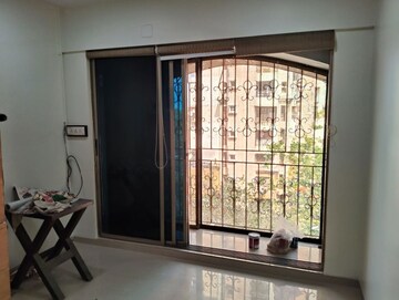 Room in 2 BHK Apartment at Shiv Kutir CHS, Andheri West – for Rent