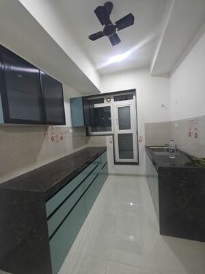 Kitchen in 2 BHK Apartment at Seawoods Sector 40 – for Rent