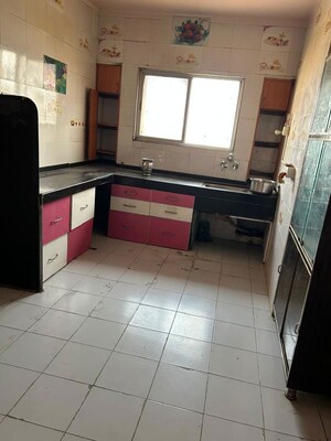 Kitchen in 2 BHK Apartment at Patil Raghukul Nagari CHS, Bopodi – for Sale