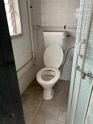 Bathroom in 2 BHK Apartment at Patil Raghukul Nagari CHS, Bopodi – for Sale