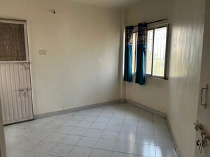 Room in 2 BHK Apartment at Patil Raghukul Nagari CHS, Bopodi – for Sale