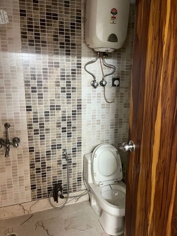 Bathroom in 4 BHK Apartment at Sector 6 Dwarka – for Rent