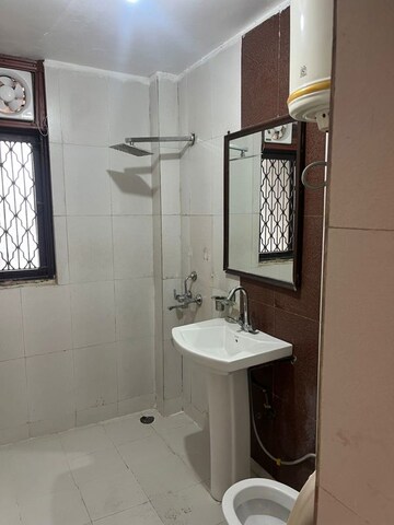Bathroom in 4 BHK Apartment at Sector 6 Dwarka – for Rent
