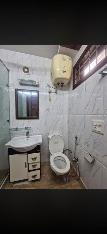 Bathroom in 3 BHK Builder Floor at Kalkaji – for Rent