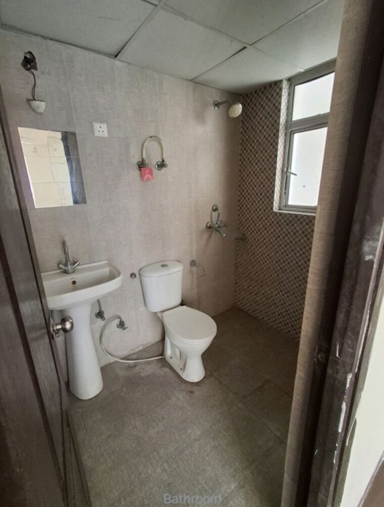 Bathroom, aditya-urban-homes 2 Bedroom 840 Sq.Ft. Apartment In Shahpur Bamheta Ghaziabad 9994544