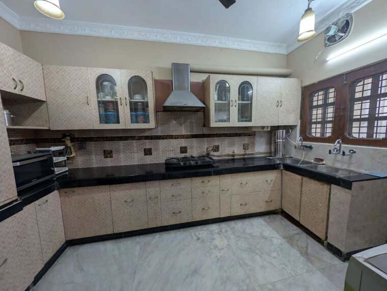 Kitchen, defence colony 3 Bedroom 325 Sq.Yd. Builder Floor In Defence Colony Delhi 9994550