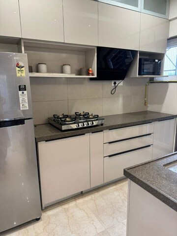 Kitchen in 2 BHK Apartment at Shapoorji Pallonji Alpine 2, Kandivali East – for Rent