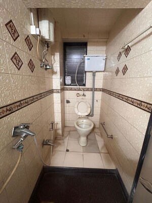 Bathroom in 2 BHK Apartment at Narayan Niwas Vile Parle East, Vile Parle East – for Rent
