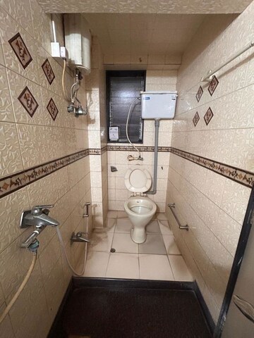 Bathroom in 2 BHK Apartment at Narayan Niwas Vile Parle East, Vile Parle East – for Rent