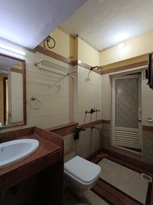 Kitchen in 2 BHK Apartment at Serenity Heights, Malad West – for Rent