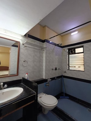 Kitchen in 2 BHK Apartment at Serenity Heights, Malad West – for Rent