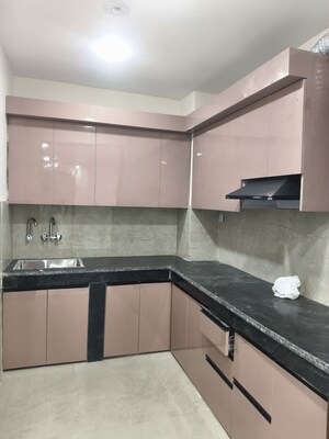 Kitchen in 3 BHK Apartment at Vishwakarma Colony – for Sale