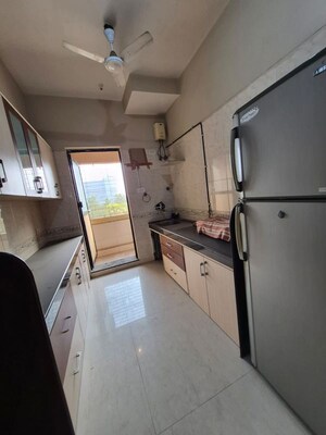 Kitchen in 3 BHK Apartment at Raheja Interface Heights, Malad West – for Rent