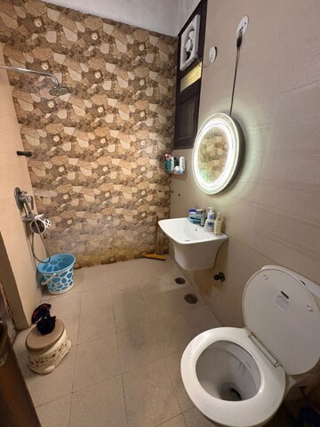 Bathroom in 1.5 BHK Apartment at RWA Apartments Sector 40, Sector 40 – for Sale