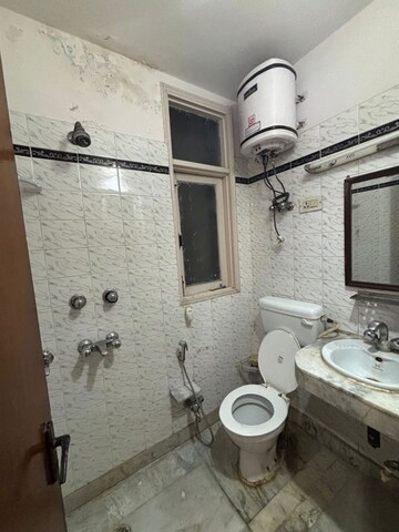 Bathroom in 3 BHK Builder Floor at Greater Kailash I – for Rent