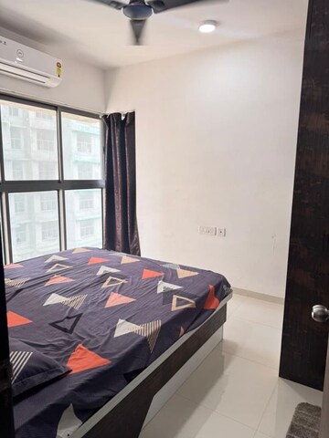 Master Bedroom in 1 BHK Apartment at UK Iridium, Kandivali East – for Rent