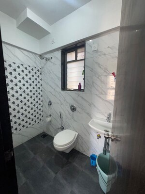 Bathroom in 1 BHK Apartment at UK Iridium, Kandivali East – for Rent