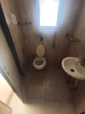 Bathroom in 1 BHK Apartment at Agarwal Trinity Tower II, Malad West – for Rent
