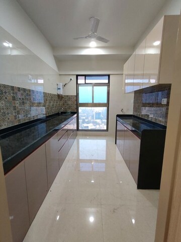 Kitchen in 3 BHK Apartment at Rajesh Raj Infinia, Malad West – for Rent