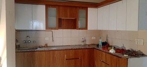 Kitchen in 3 BHK Apartment at Ajnara Le Mart, Sector 16b Greater Noida – for Rent