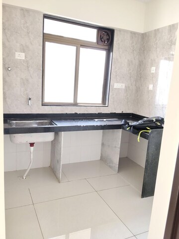 Kitchen in 1 BHK Apartment at Godrej Nest Kandivali, Kandivali East – for Rent