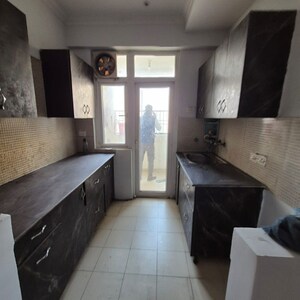 Kitchen in 2 BHK Apartment at Amrapali Silicon City, Sector 76 – for Sale