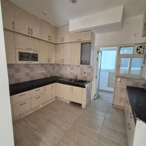 Kitchen in 2 BHK Apartment at Amrapali Silicon City, Sector 76 – for Sale