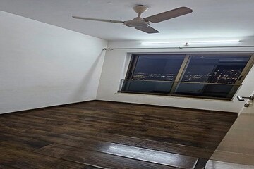 Room in 2.5 BHK Apartment at Kalpataru Aura, Ghatkopar West – for Sale