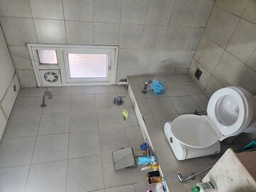 Bathroom in 2 BHK Apartment at Bhartiya Nikoo Homes, Thanisandra Main Road – for Rent