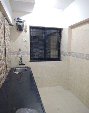 Kitchen in 1 BHK Apartment at K Raheja Palm Spring, Malad West – for Rent