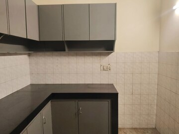 Kitchen in 2 BHK Apartment at Amar Colony – for Sale