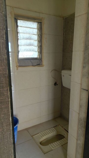 Bathroom in 1 BHK Apartment at Navkar Building, Nalasopara West – for Rent