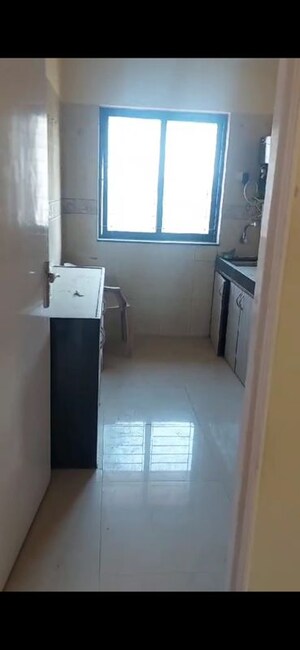 Kitchen in 2 BHK Apartment at K Raheja Palm Spring, Malad West – for Rent