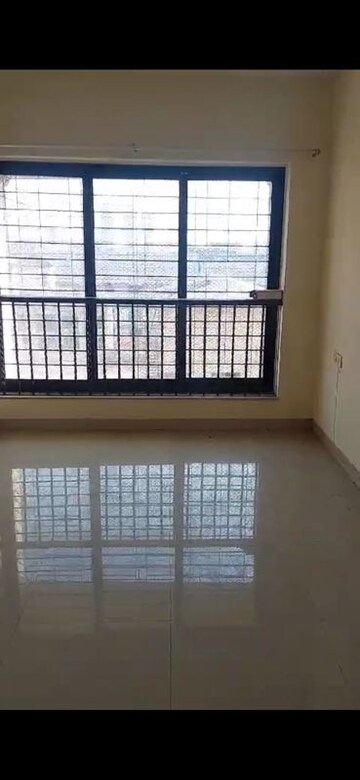 Living Room in 2 BHK Apartment at K Raheja Palm Spring, Malad West – for Rent