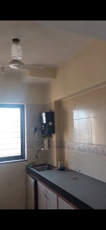 Kitchen in 2 BHK Apartment at K Raheja Palm Spring, Malad West – for Rent