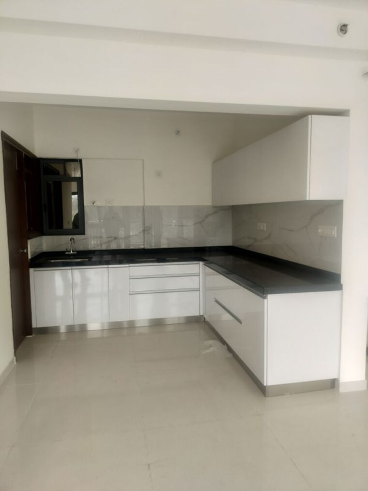 Kitchen, amanora-elivate-tower 2 Bedroom 863 Sq.Ft. Apartment In Hadapsar Pune 9995328