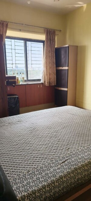 Bedroom in 3 BHK Apartment at K Raheja Palm Spring, Malad West – for Rent