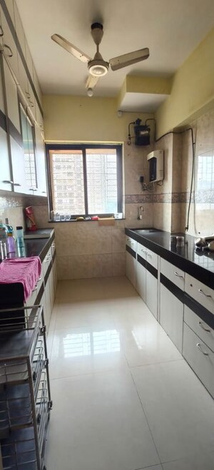 Kitchen in 3 BHK Apartment at K Raheja Palm Spring, Malad West – for Rent