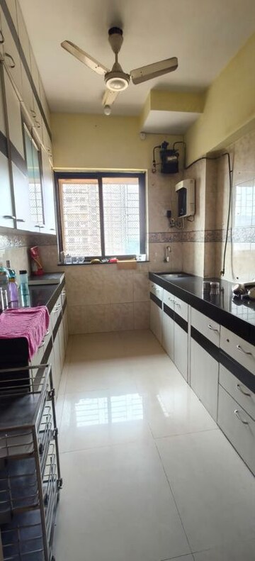 Kitchen in 3 BHK Apartment at K Raheja Palm Spring, Malad West – for Rent